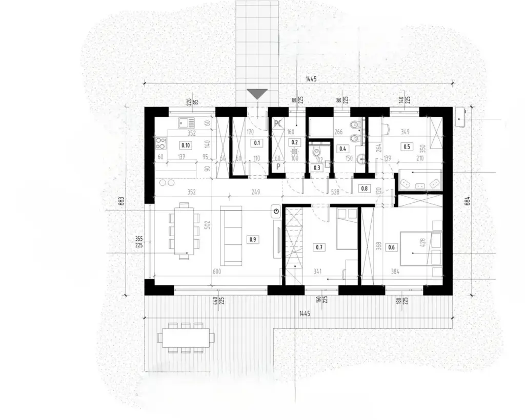 Furnished floor plan with an open living zone at one end and private rooms at the other